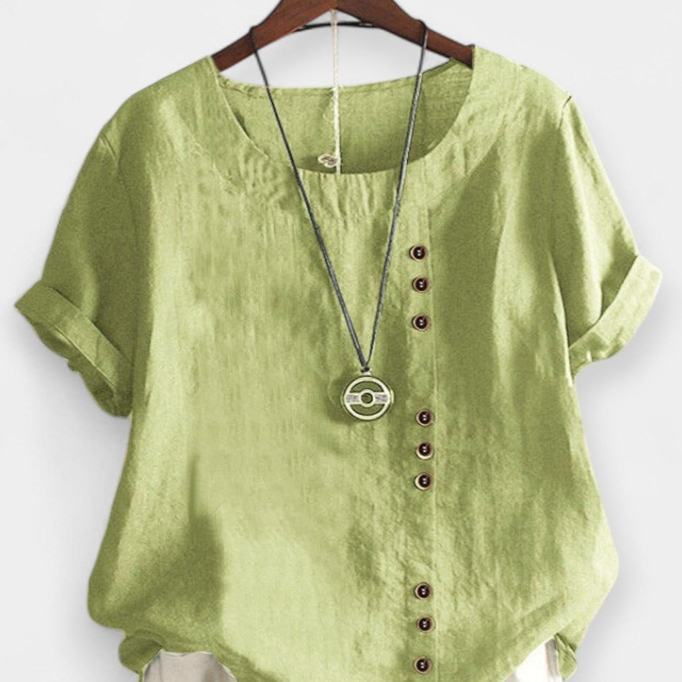Tricou cu mânecă scurtă și nasturi
