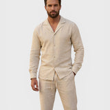 Alexandra Oradea men's beige linen set with cuban collar shirt and drawstring trousers, perfect for summer.