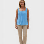 Alexandra Oradea blue U-neck sleeveless pleated top made of cotton blend, perfect for summer comfort and style.