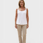 Alexandra Oradea white U-neck sleeveless pleated top made of cotton blend, perfect for summer comfort and casual style.